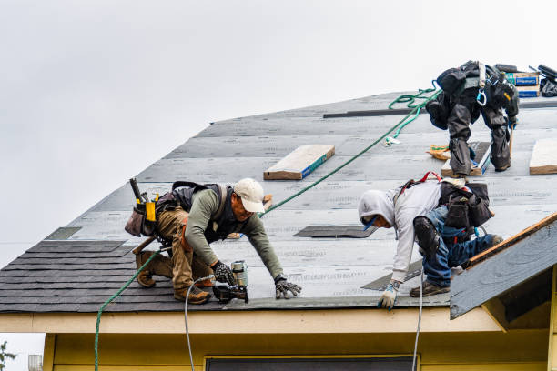 Professional Gutter Installation technician working in Earlington, PA